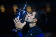 Novak Djokovic with the trophy at the 2018 US Open.